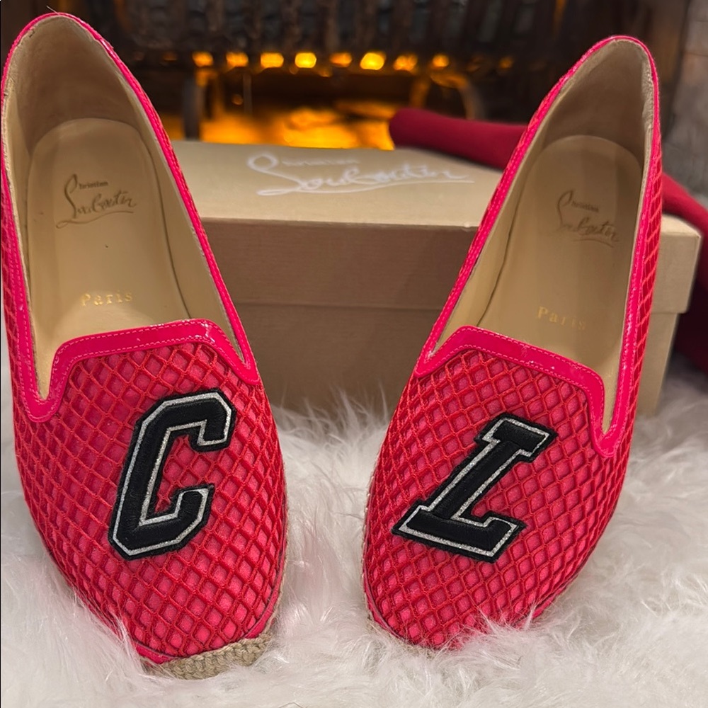 Christian Louboutin Red Flats with Black Accents